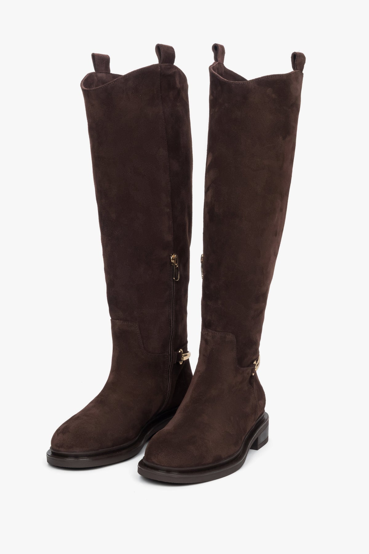 Crafted from rich genuine velour, these over-the-knee boots bring a refined texture and timeless charm to your look.