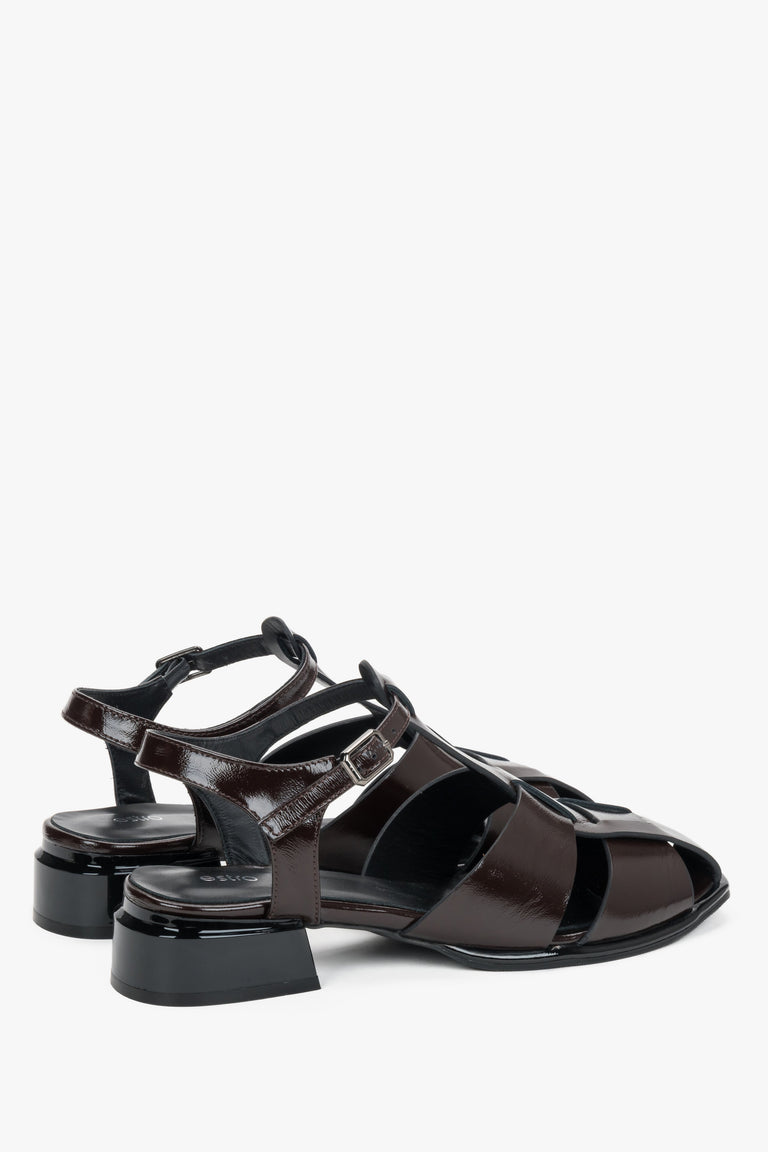 Made of genuine patent leather, women's dark brown sandals on a low block heel Estro.