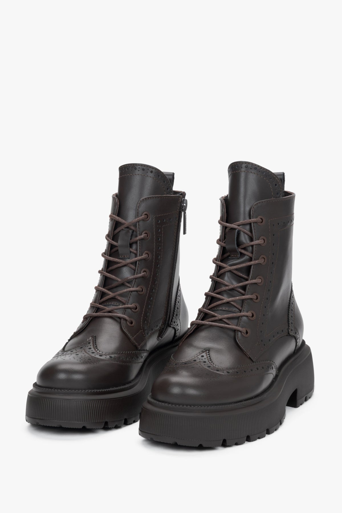 Dark brown natural leather ankle boots featuring folk-style laser perforation details, Estro.
