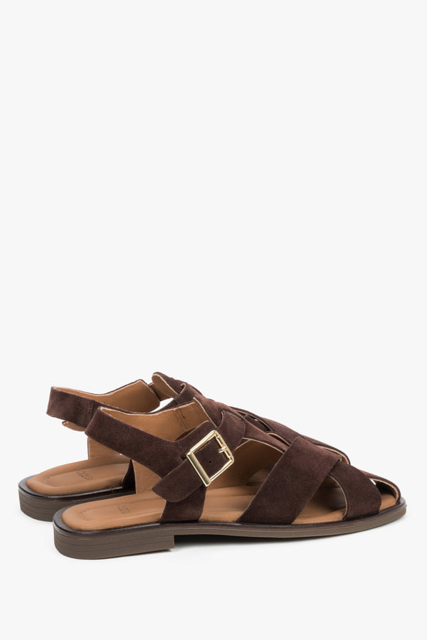Dark brown Estro women’s sandals made of natural suede with crisscross straps and a buckle.
