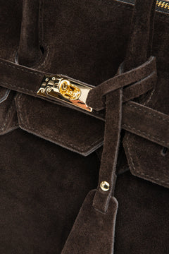 Gold-tone hardware and precise stitching highlight the luxurious craftsmanship and Italian attention to detail.