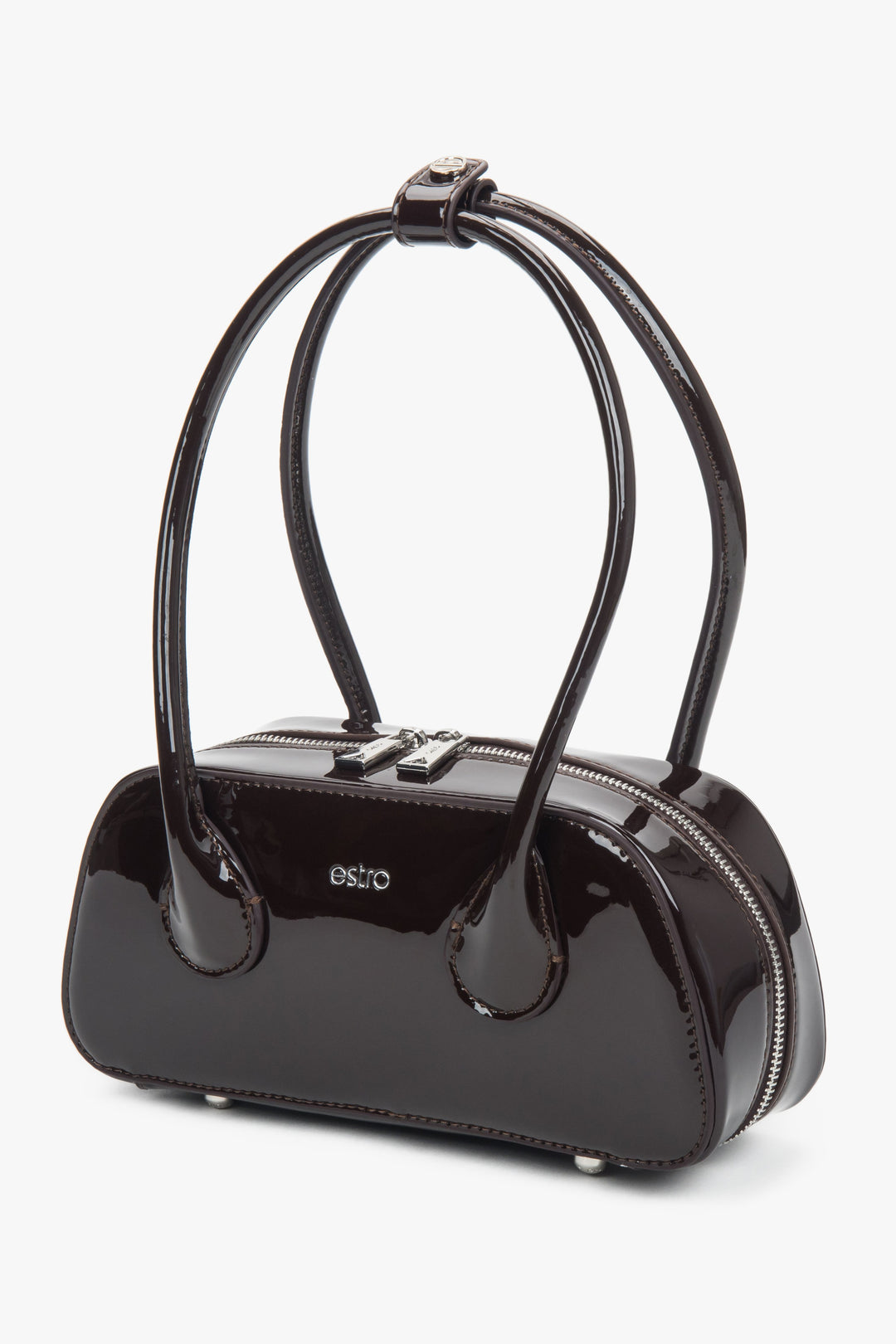 Handle detail with brand logo pin allows adjusting or securing the straps.