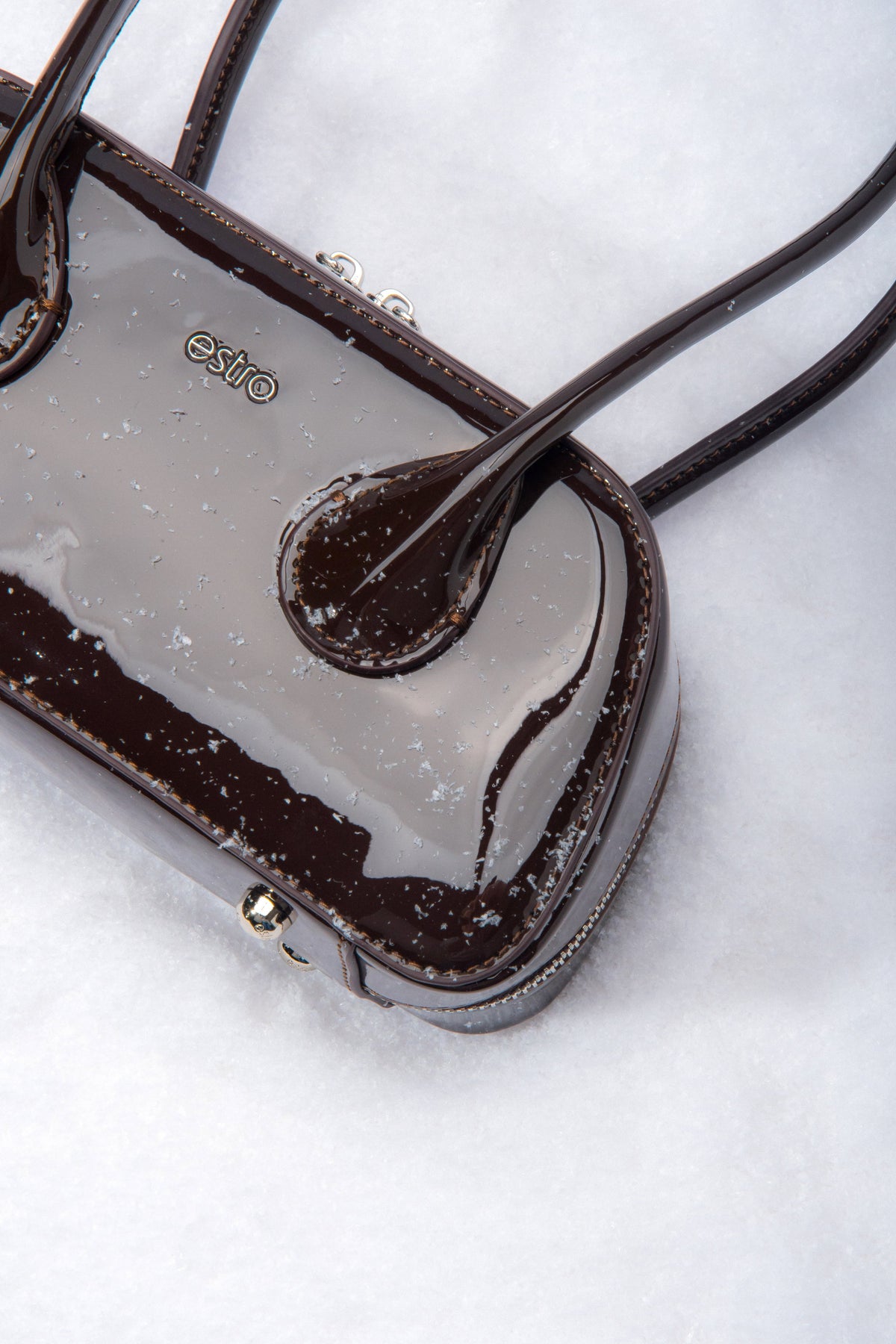 Secure zip closure keeps your essentials safe and accessible.