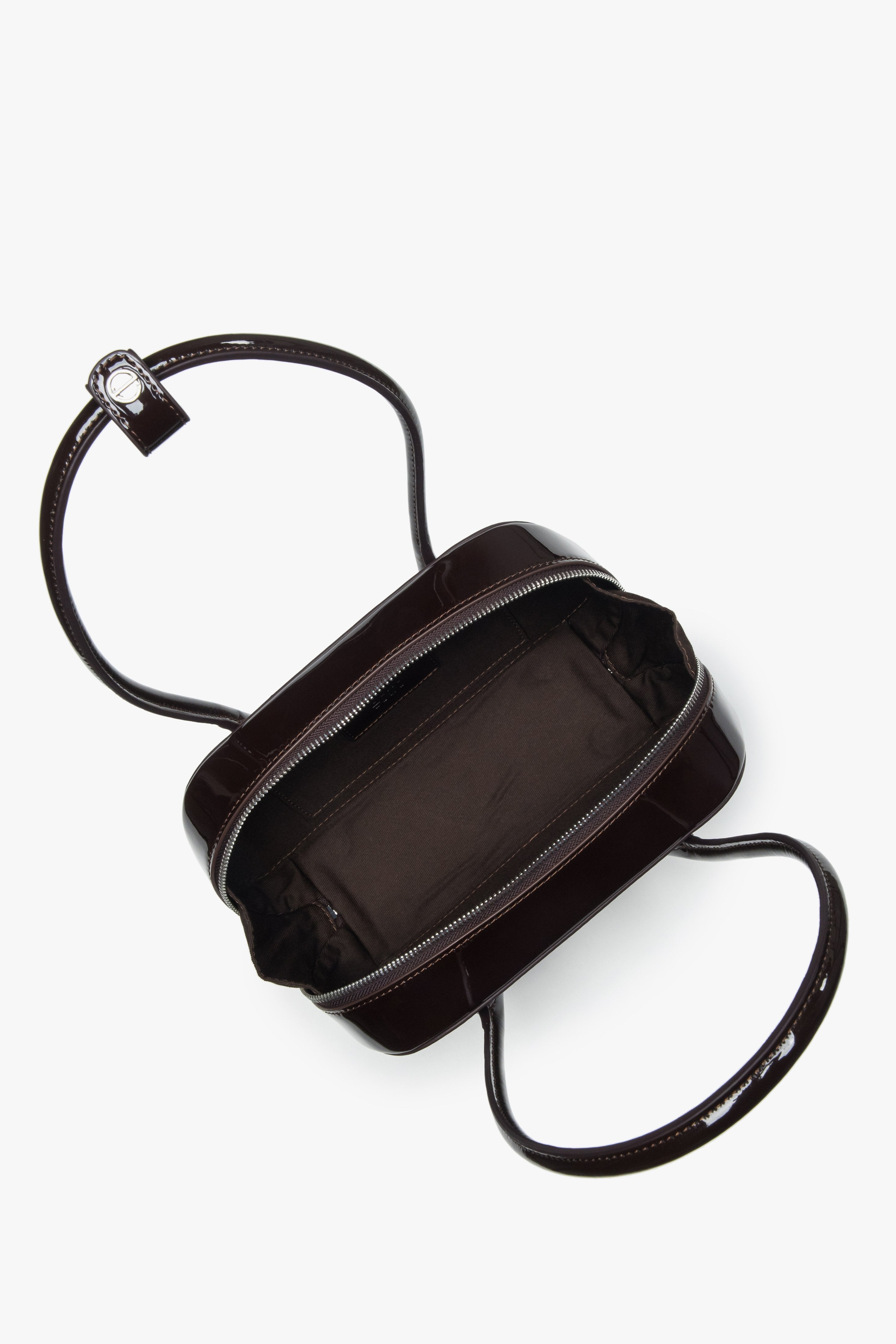 Single main compartment with an interior pocket for organized storage.