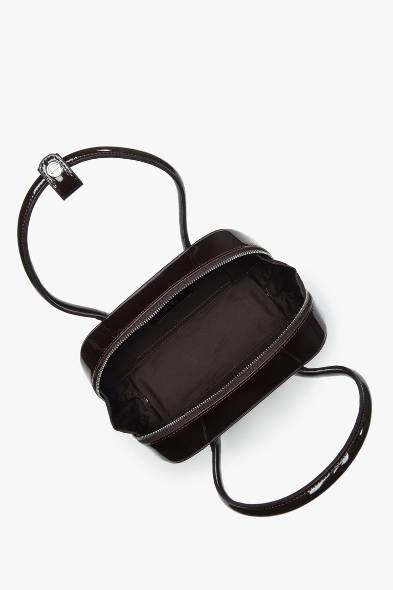 Single main compartment with an interior pocket for organized storage.