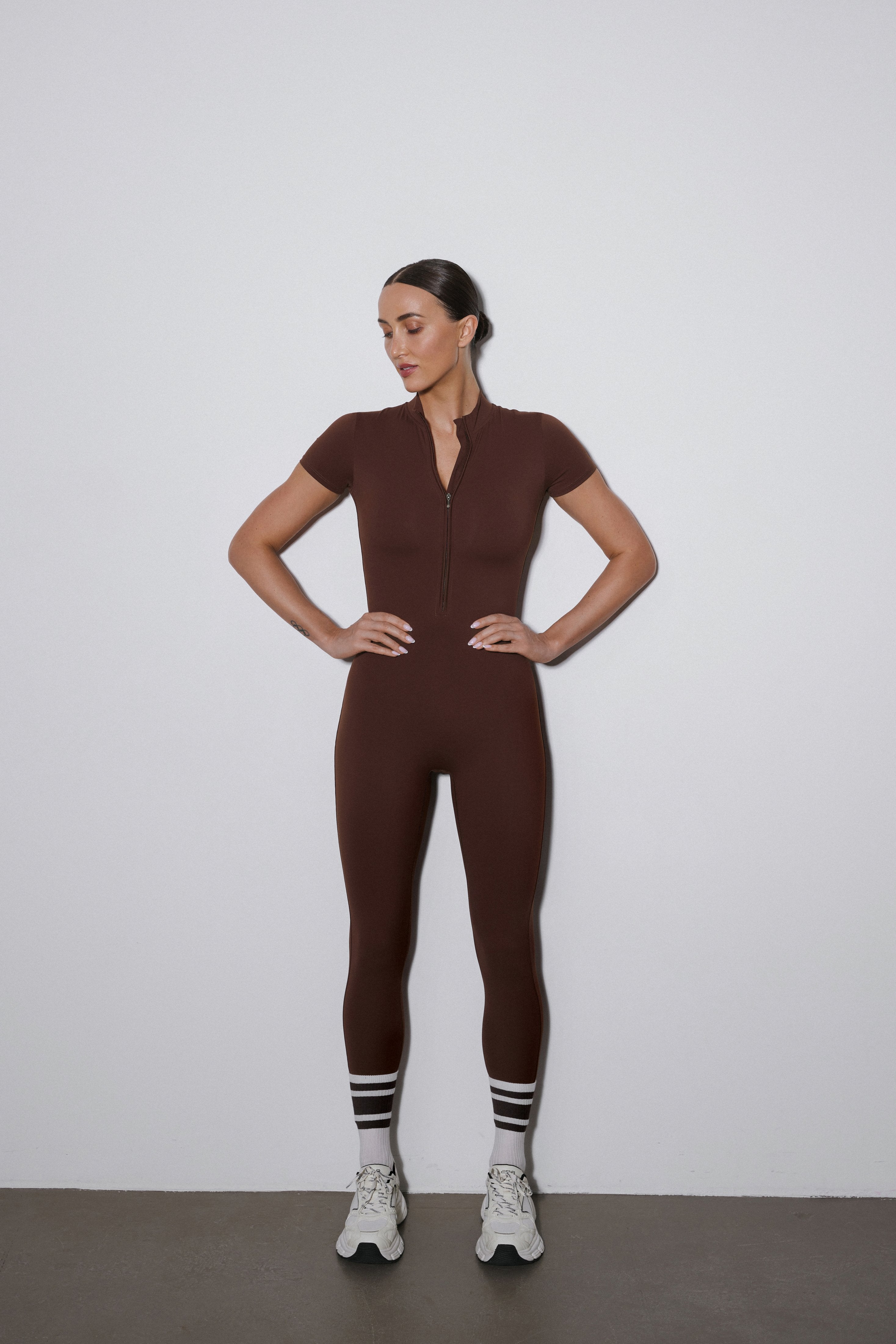 Women's dark brown sporty slim fit jumpsuit with short sleeves Estro.