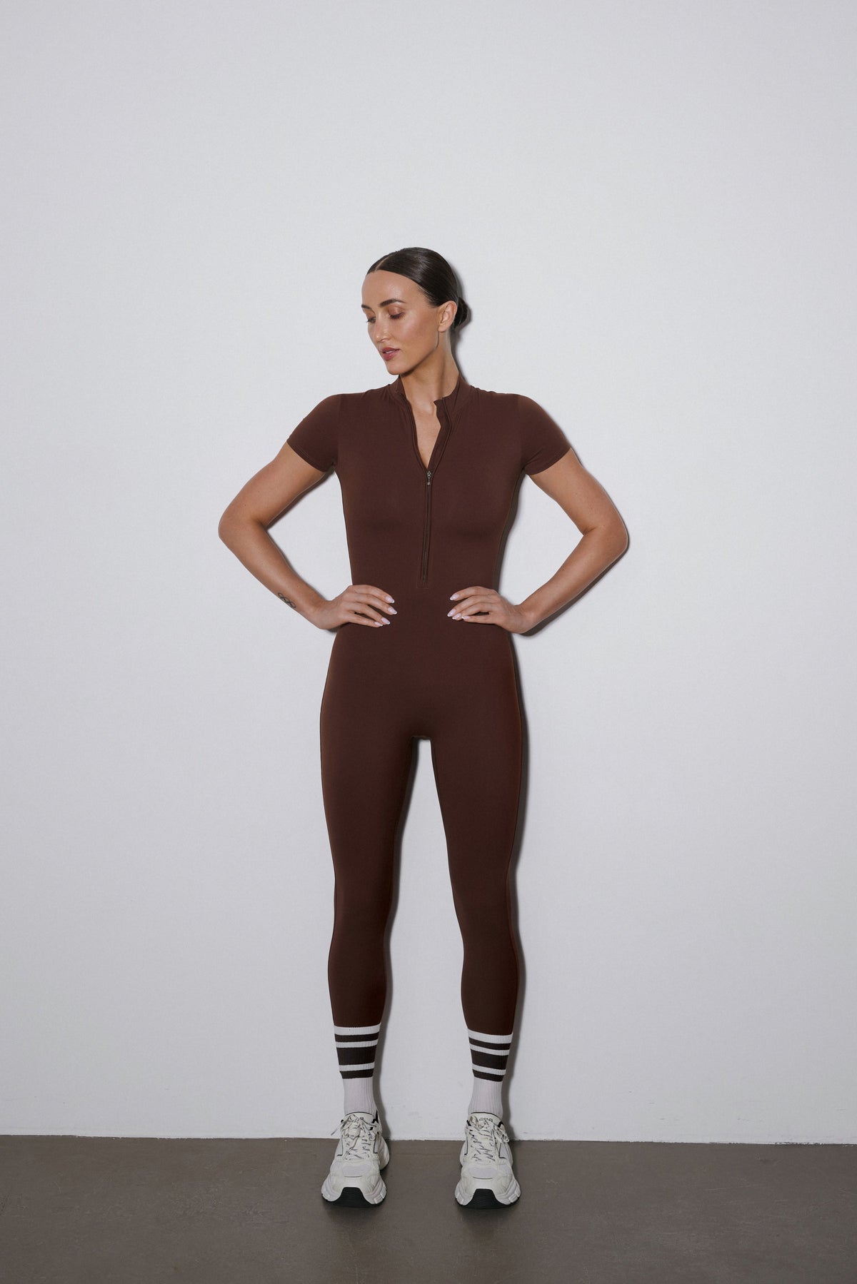 Women's dark brown sporty slim fit jumpsuit with short sleeves Estro.