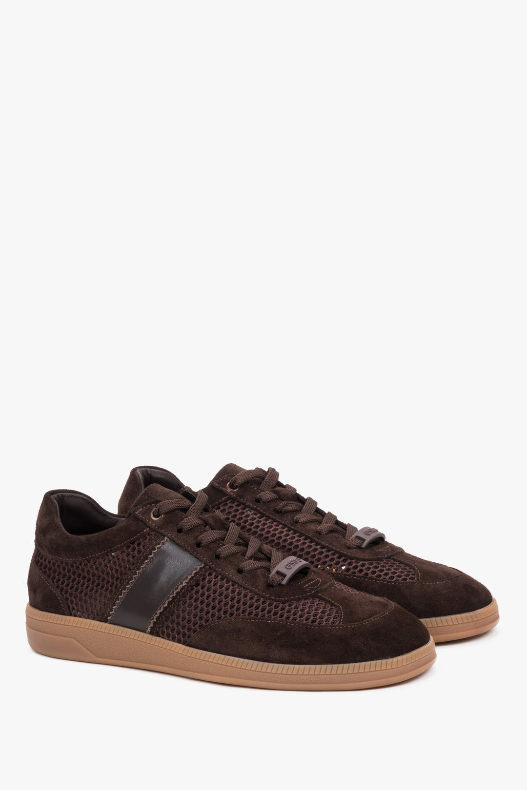 Side profile of dark brown mesh and leather sneakers.