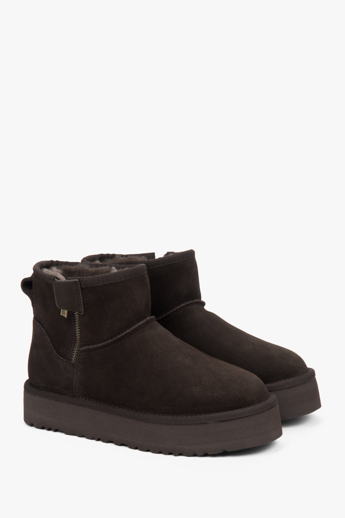 Women's snow boots made of genuine velour, lined with fur, in dark brown.