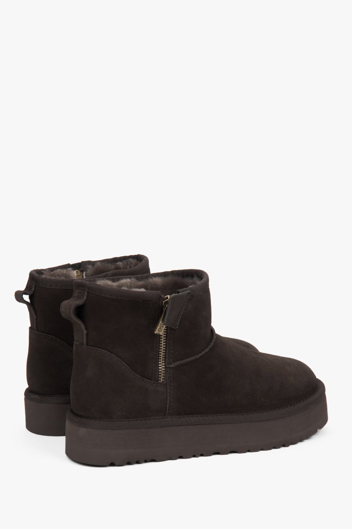 Brown women's velour snow boots with fur.