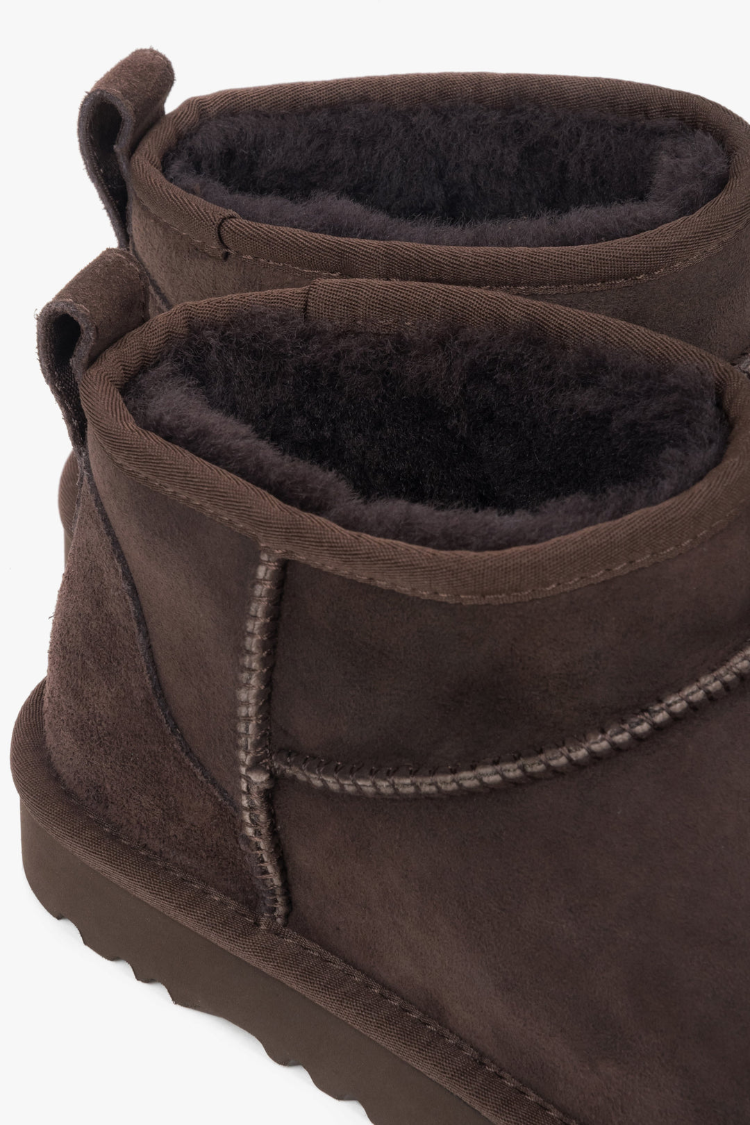 Estro women’s snow boots made of dark brown genuine velour with soft, furry insulation.