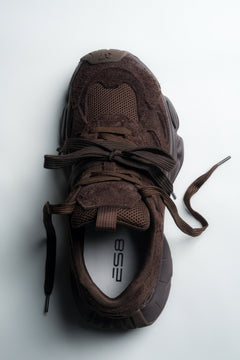 Dark brown women's velour sneakers by Estro – a clean side profile showing the bold, geometric platform sole.