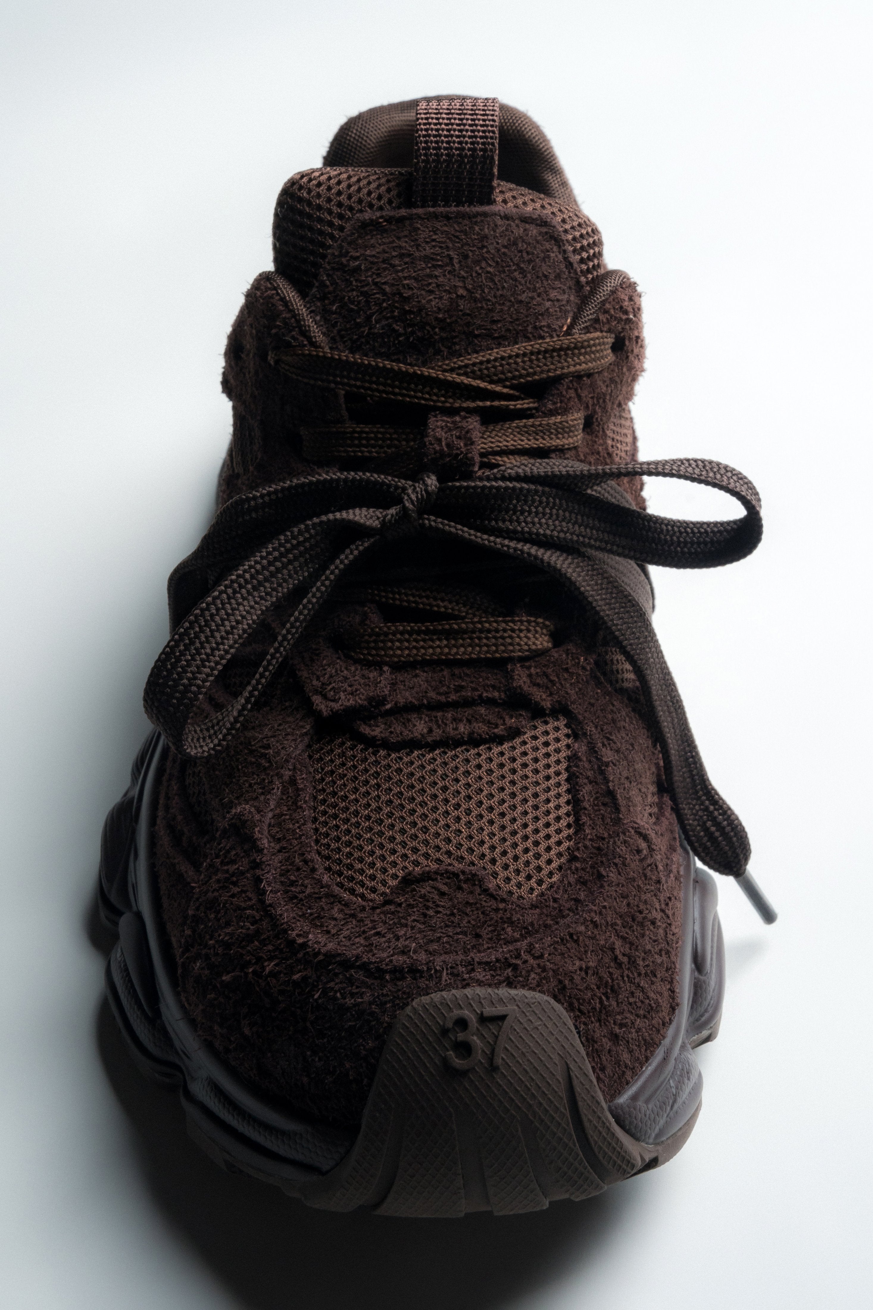 Women's dark brown velour sneakers by Estro – detailed shot of the flexible, shock-absorbing thermoplastic rubber (TPR) platform.
