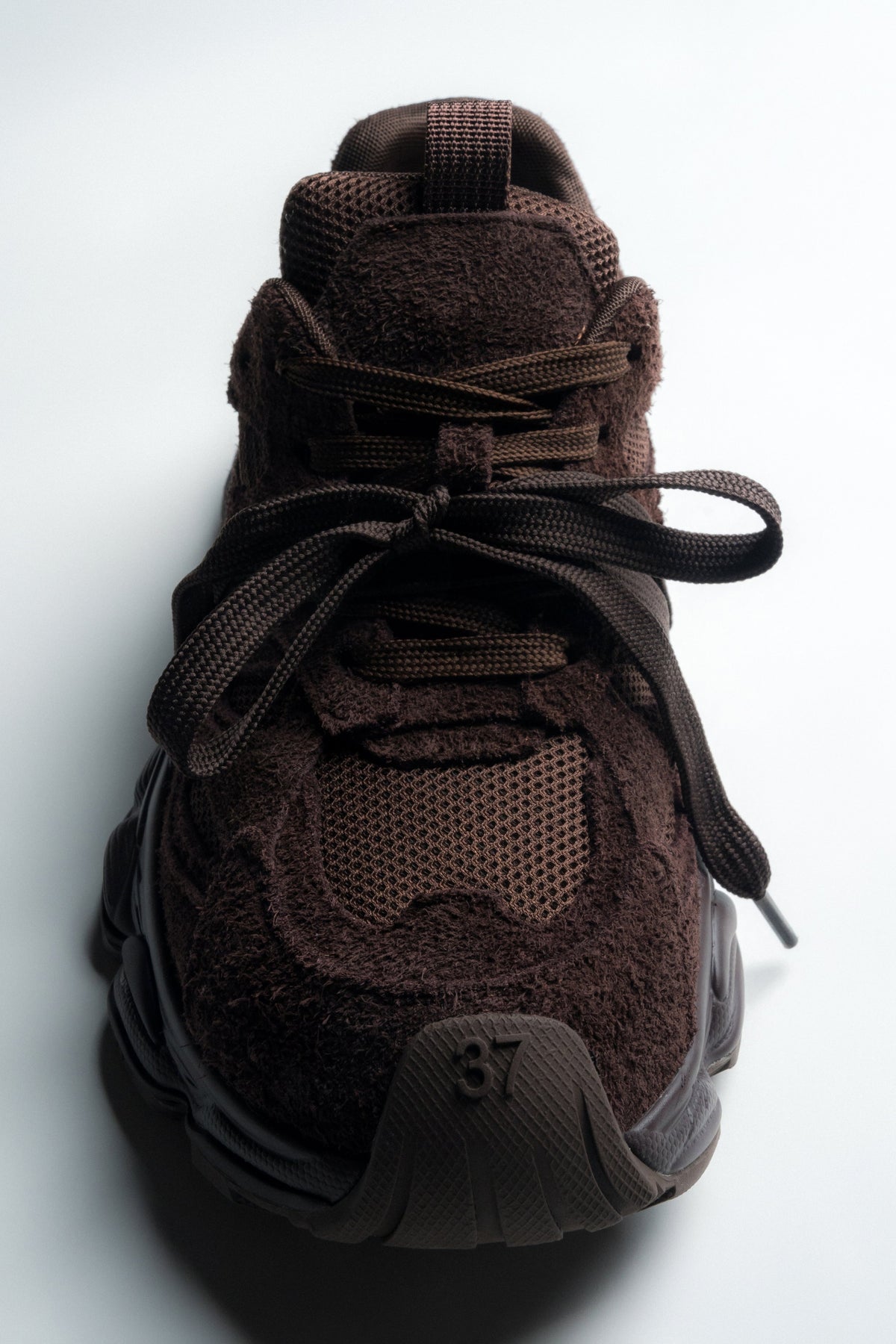 Women's dark brown velour sneakers by Estro – detailed shot of the flexible, shock-absorbing thermoplastic rubber (TPR) platform.