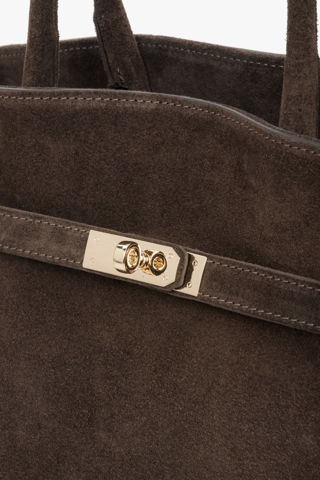 A structured tote with refined details — gold-tone zipper and contrasting handles add a touch of sophistication.