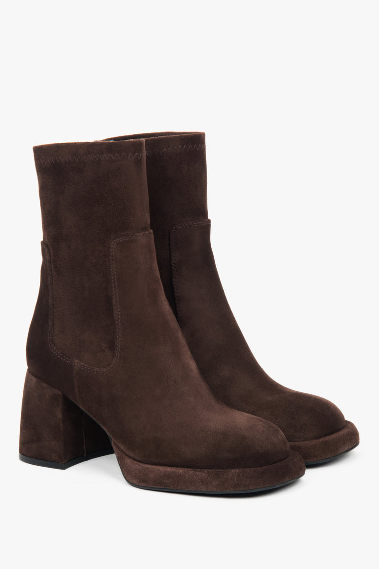Women's dark brown ankle boots made of genuine velour and stretch with a stable heel.