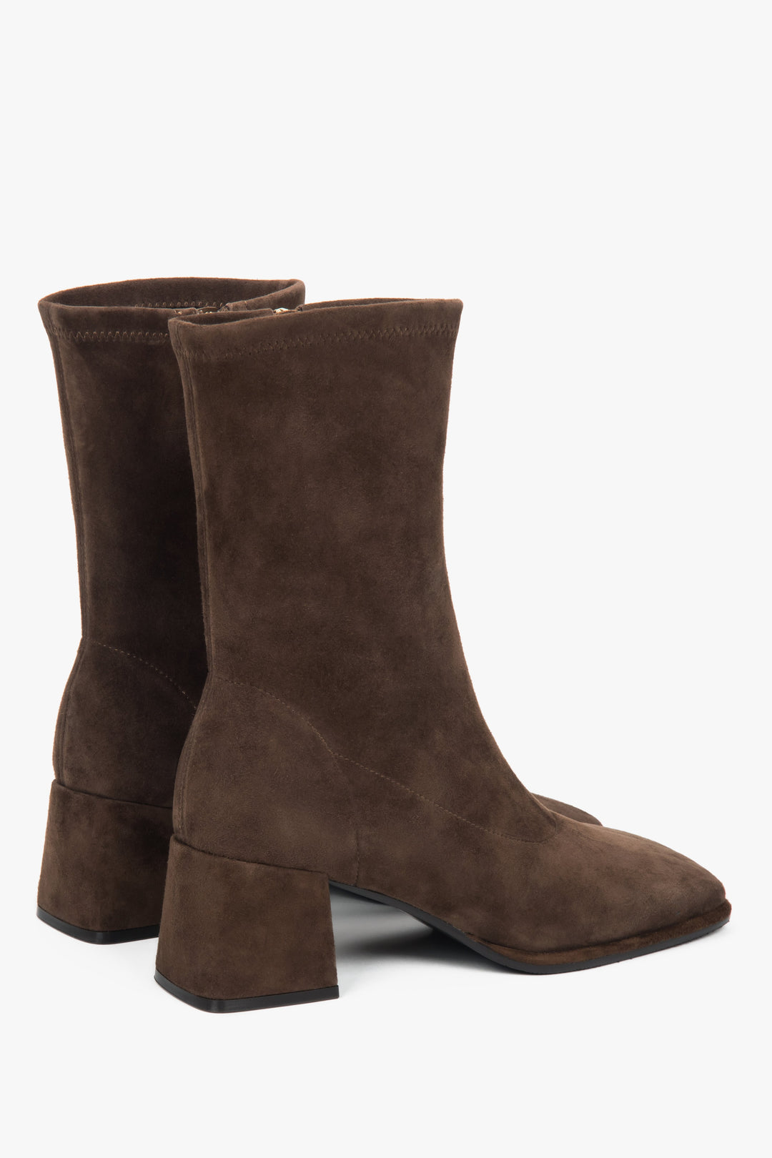 On a stable square heel, dark brown women’s ankle boots in natural velour Estro.