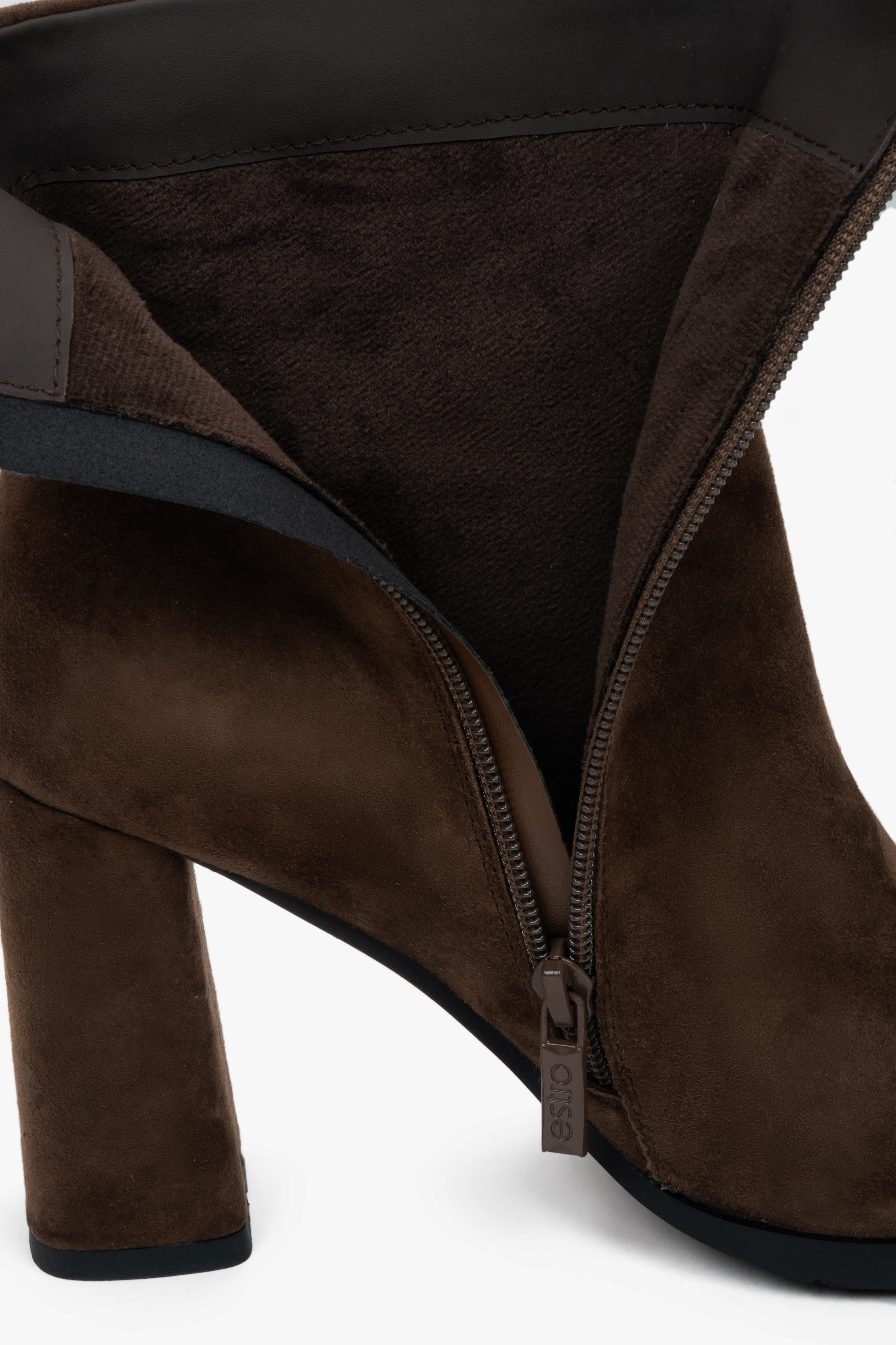 Made of genuine velour, dark brown women’s ankle boots with block heel Estro.