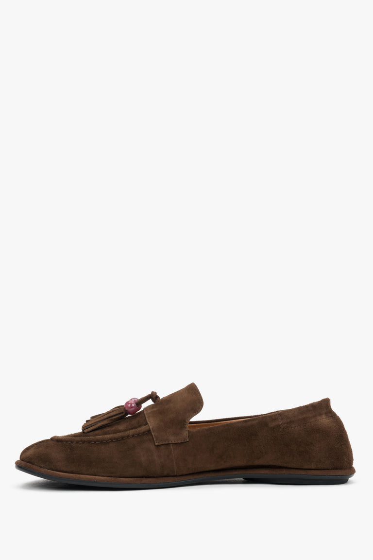 A profile shot of the women's dark brown loafers highlighting the ultra-flat, flexible barefoot sole and the soft upper construction.