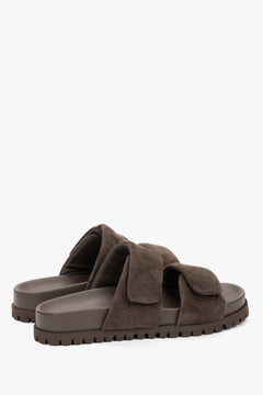 Angled view of women's dark brown velour mules with rubber sole