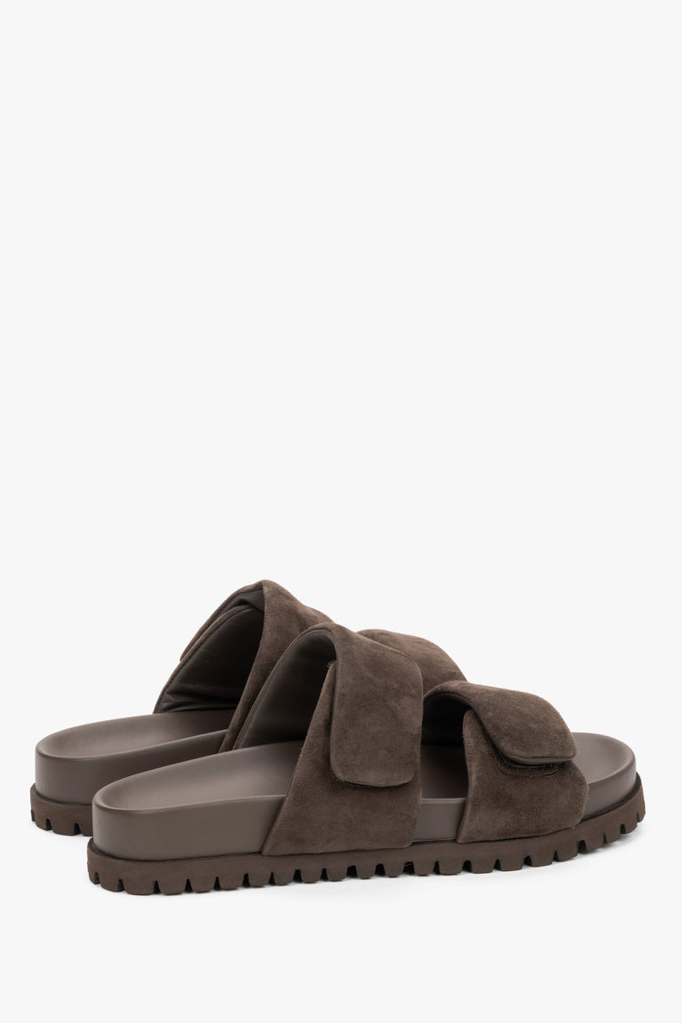 Angled view of women's dark brown velour mules with rubber sole