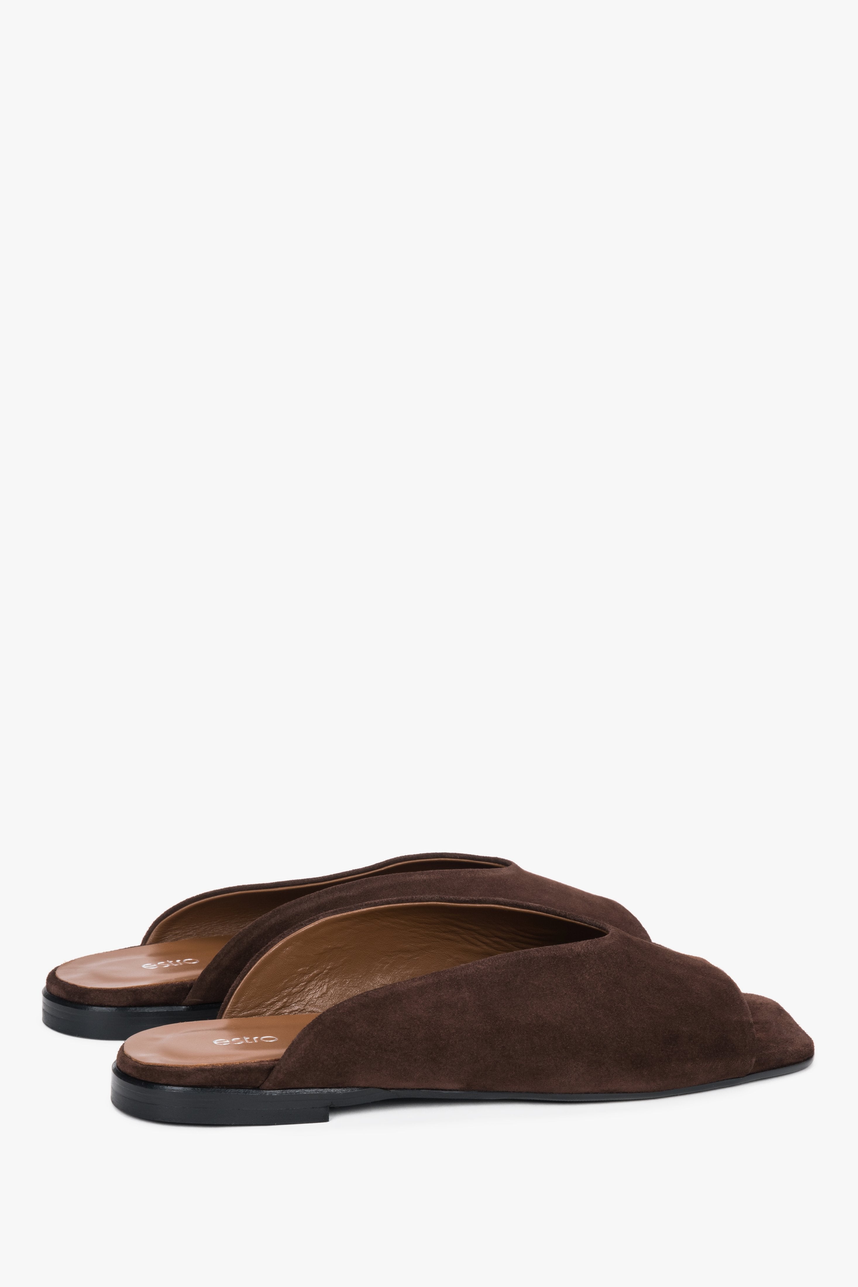 Angled view of women's dark brown velour mules with TPU sole