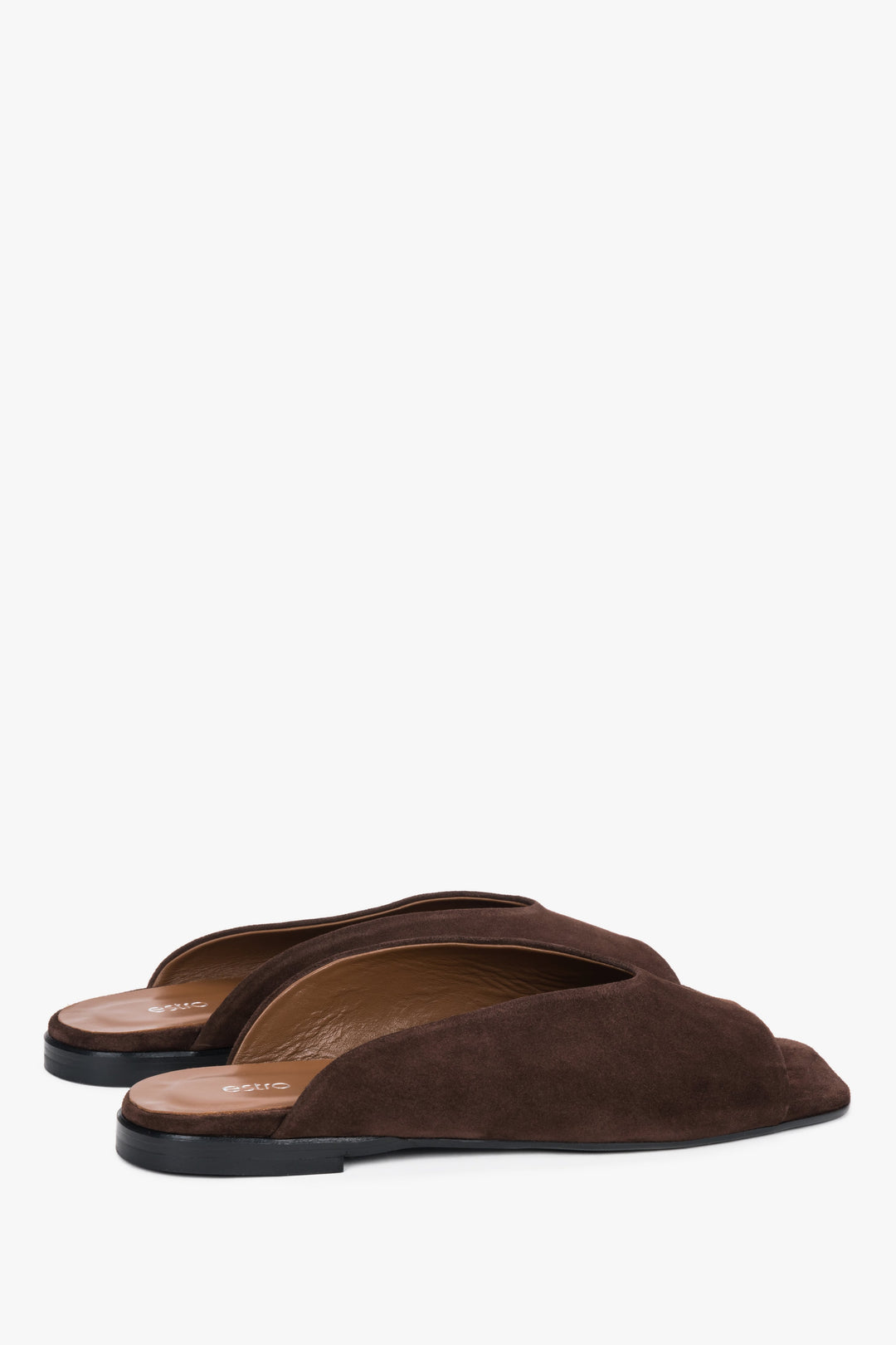 Angled view of women's dark brown velour mules with TPU sole