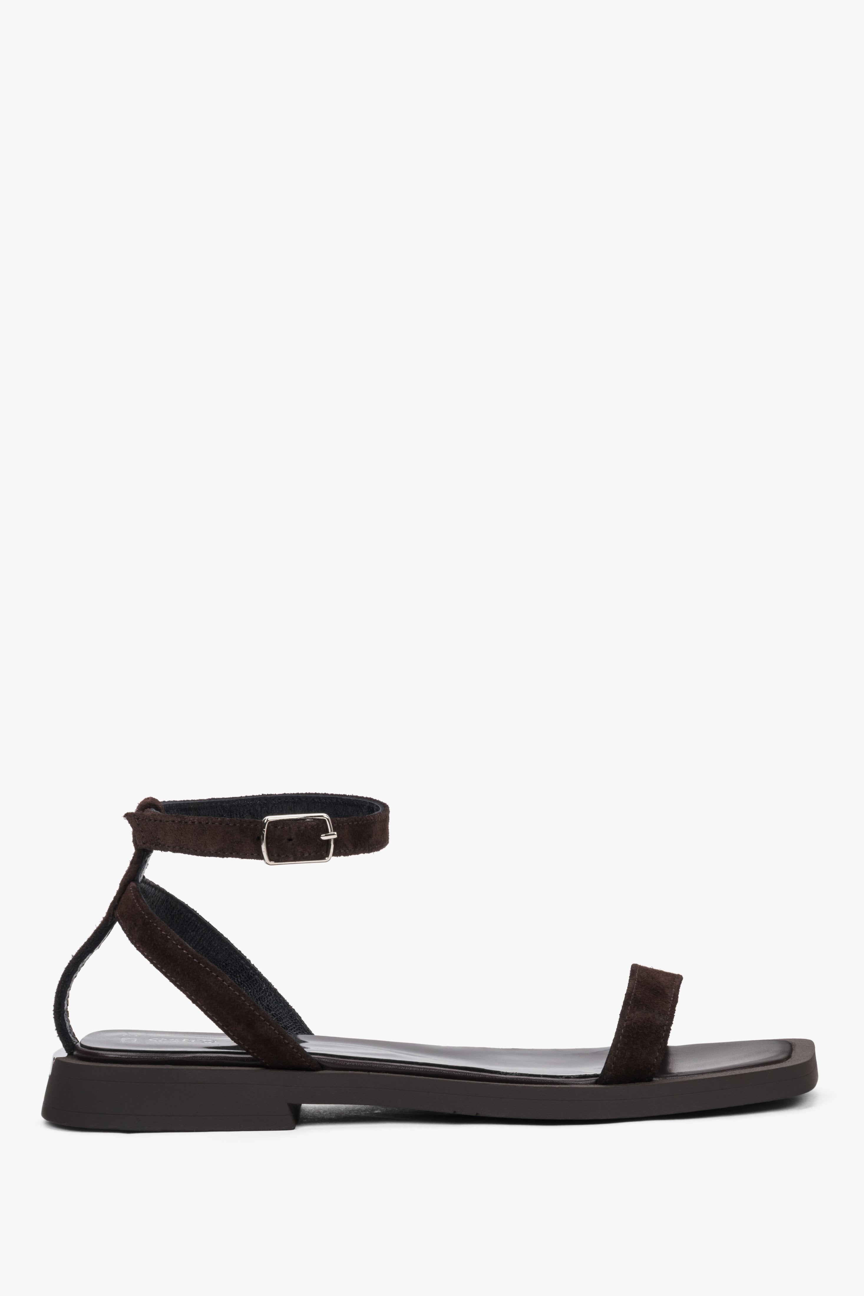 Women’s dark brown velour flat sandals by Estro with thin straps.