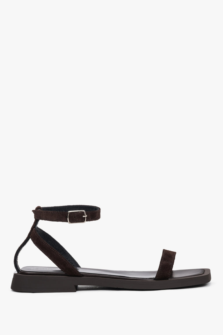 Women’s dark brown velour flat sandals by Estro with thin straps.