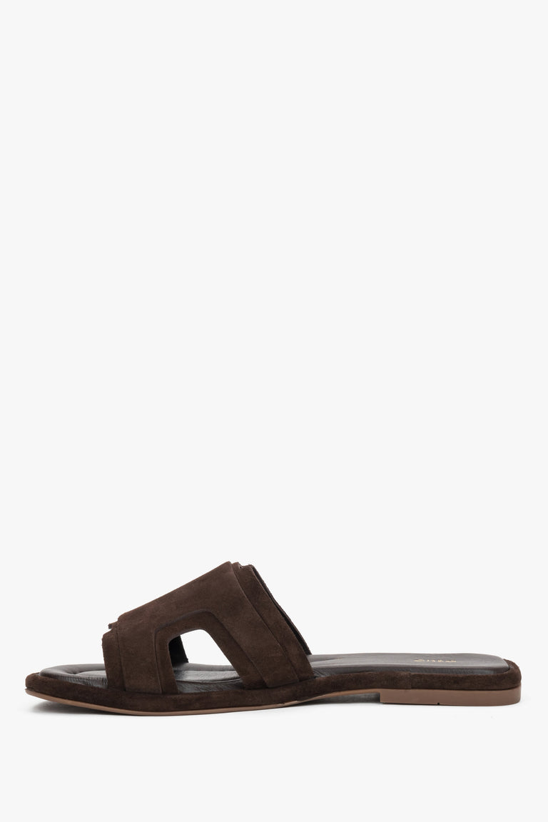A profile shot of the dark brown slides showcasing the flat, flexible TPU sole and the secure, comfortable design of the wide straps.