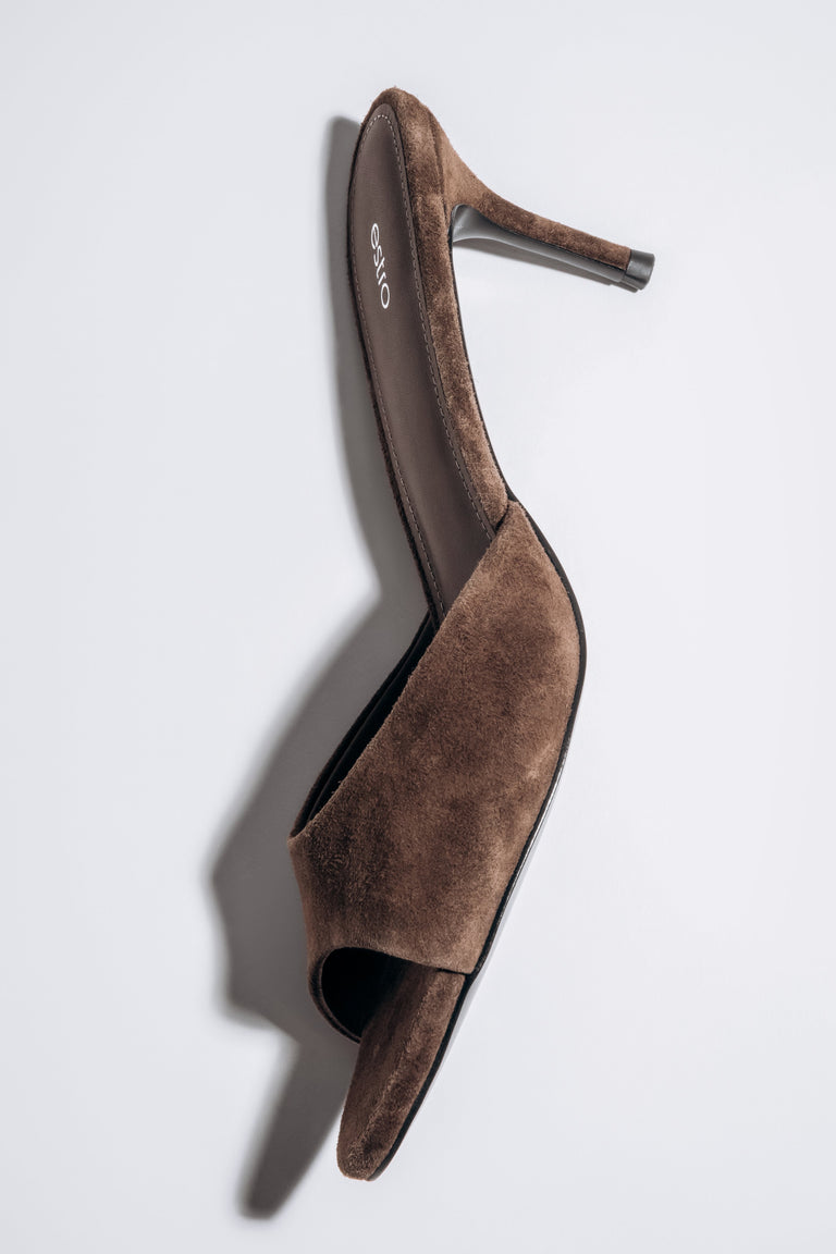 Back angled view of women's dark brown velour heeled mules