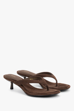 Side view of women's dark brown velour mules with low heel