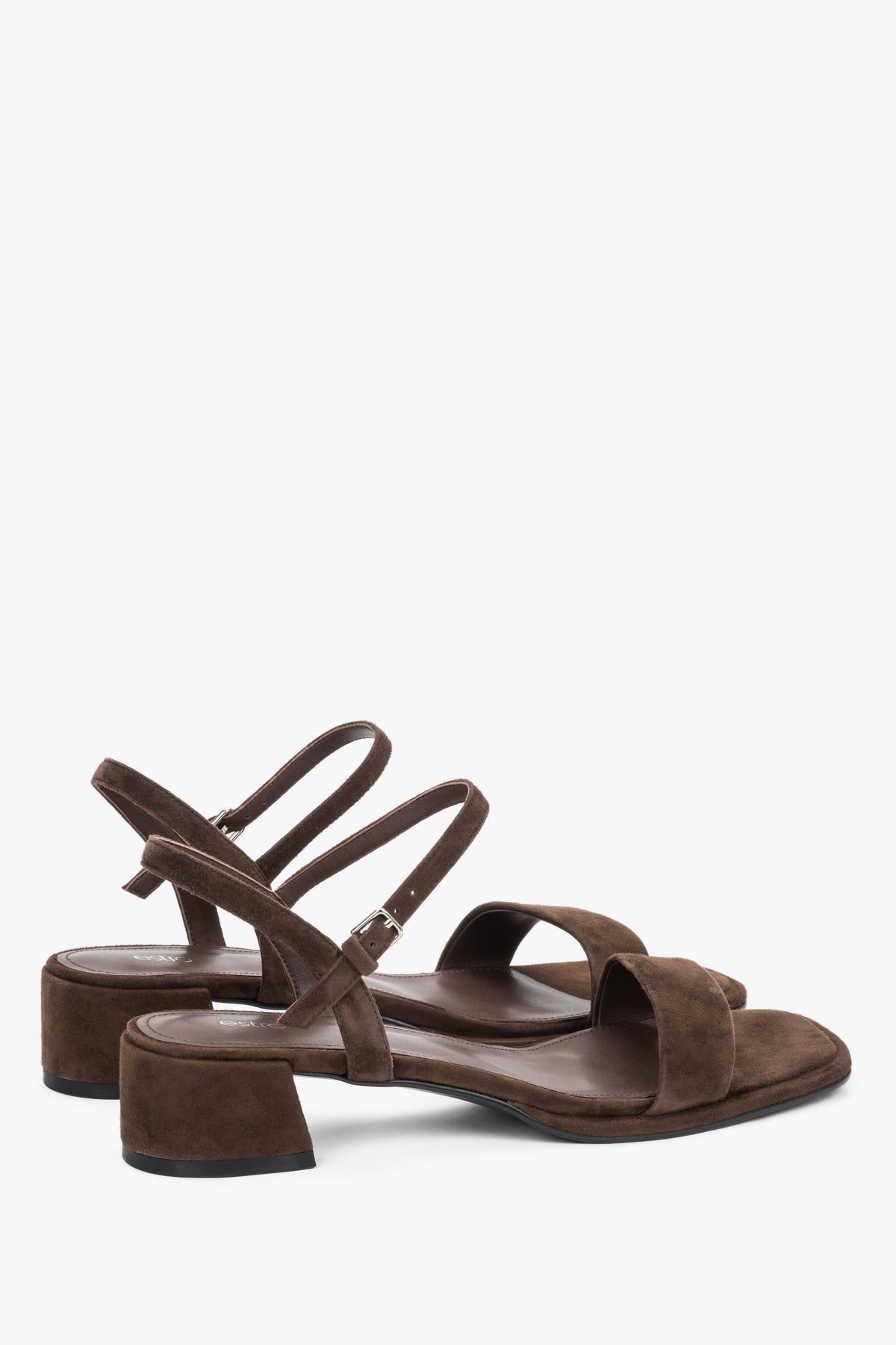 Estro dark brown sandals featuring a stable square heel and adjustable strap.