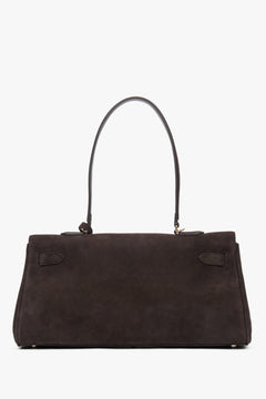 Dark brown women’s shoulder bag made of genuine velour with gold hardware.