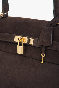 Dark brown women’s velour shoulder bag with gold hardware, Estro.