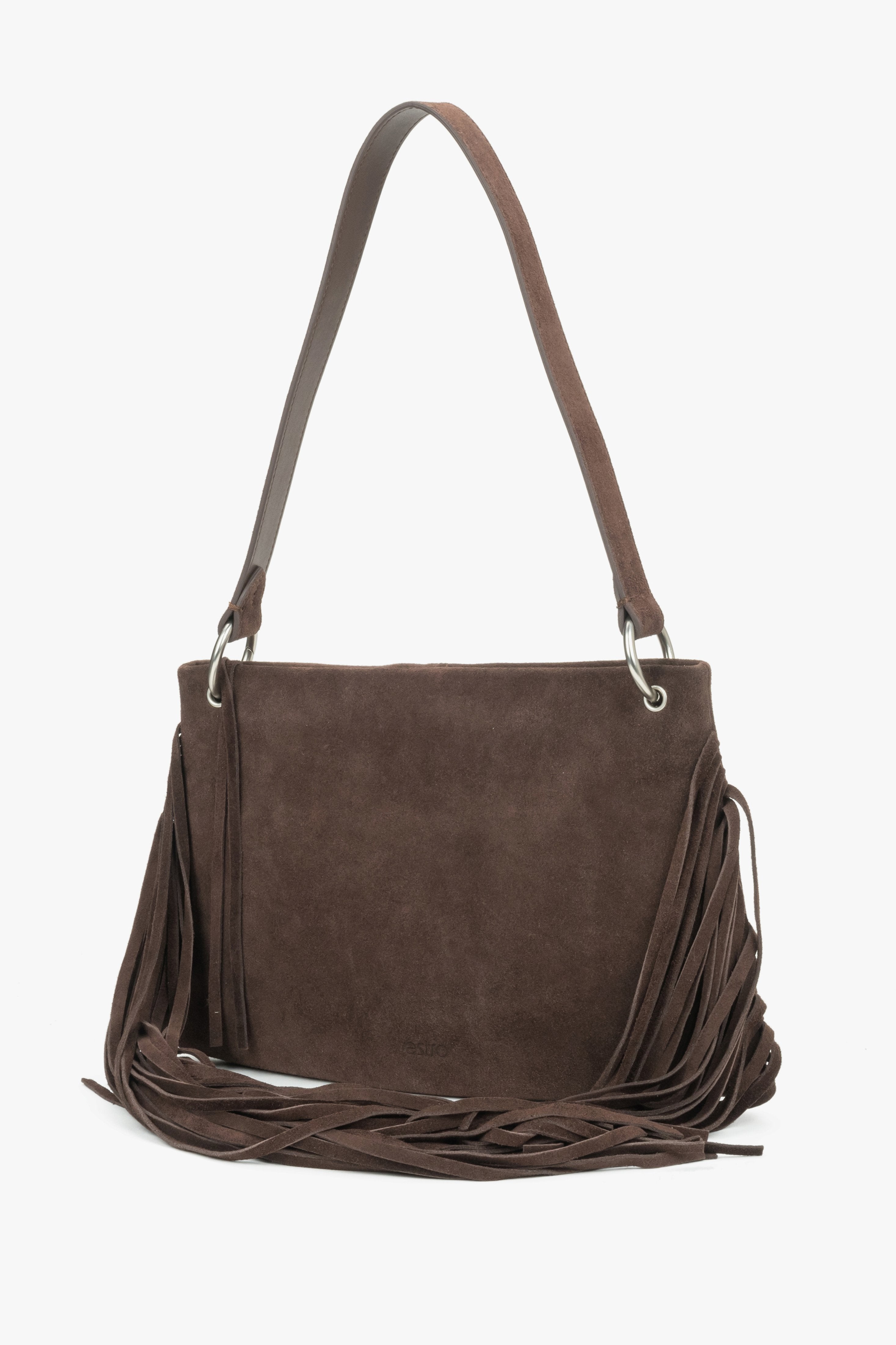 A side presentation of the bag, showcasing how beautifully the long fringes drape below the bottom edge of the bag while being worn.
