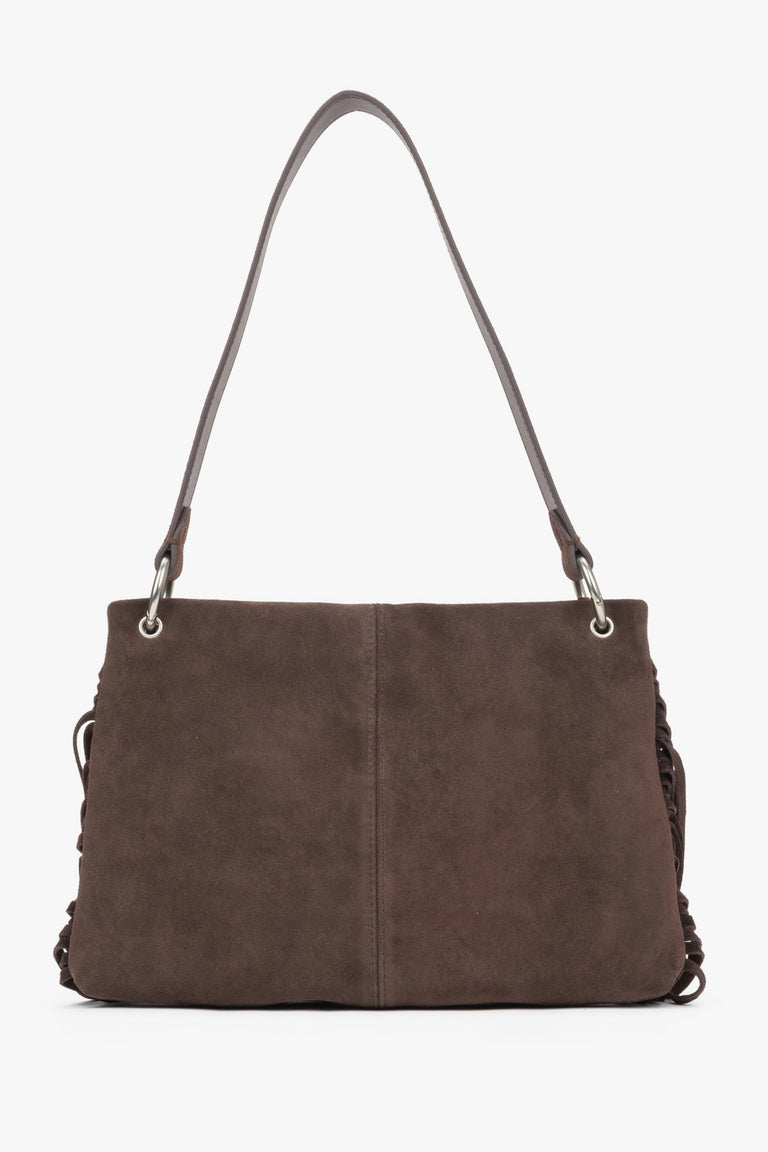 The back of the bag displaying precise, vertical stitching down the center and the matte, luxurious texture of the suede material.