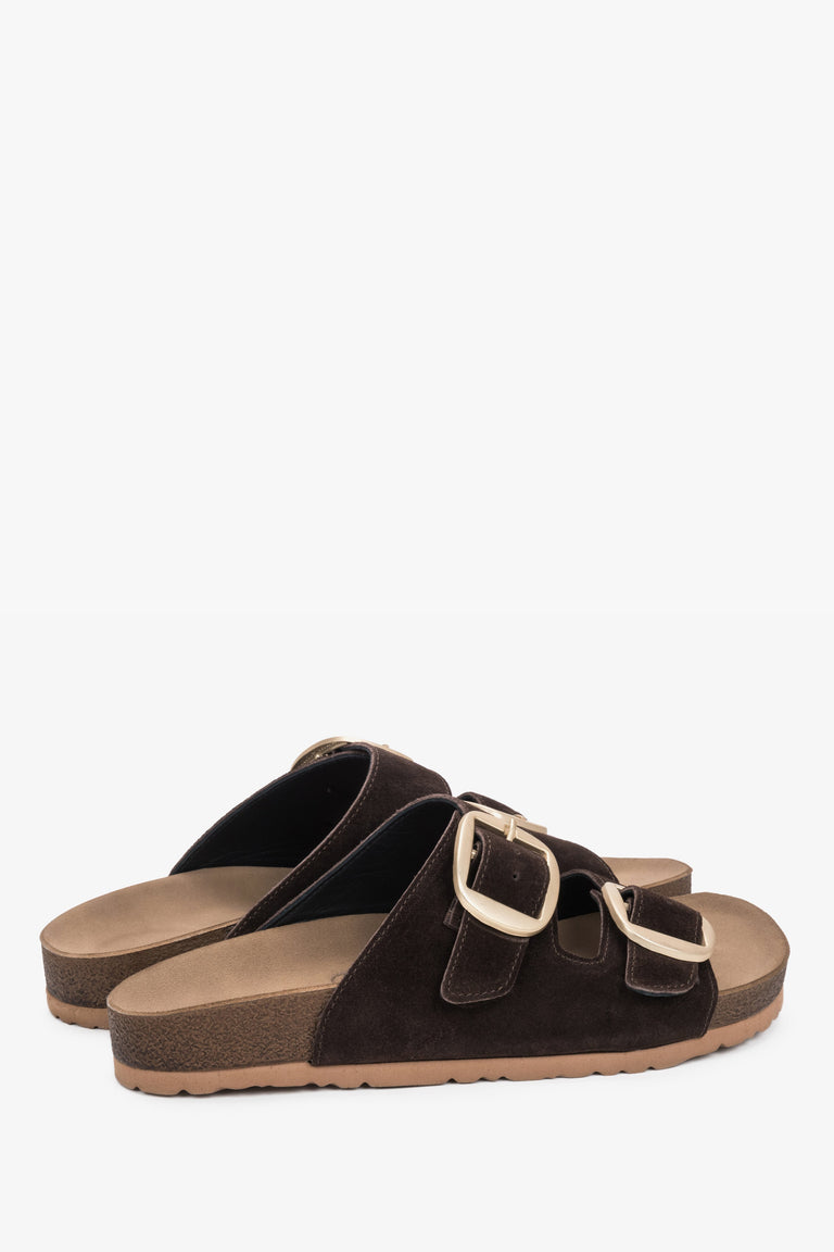 The back of the shoe showing the stable sole construction and the precise edge finishing of the premium natural suede.