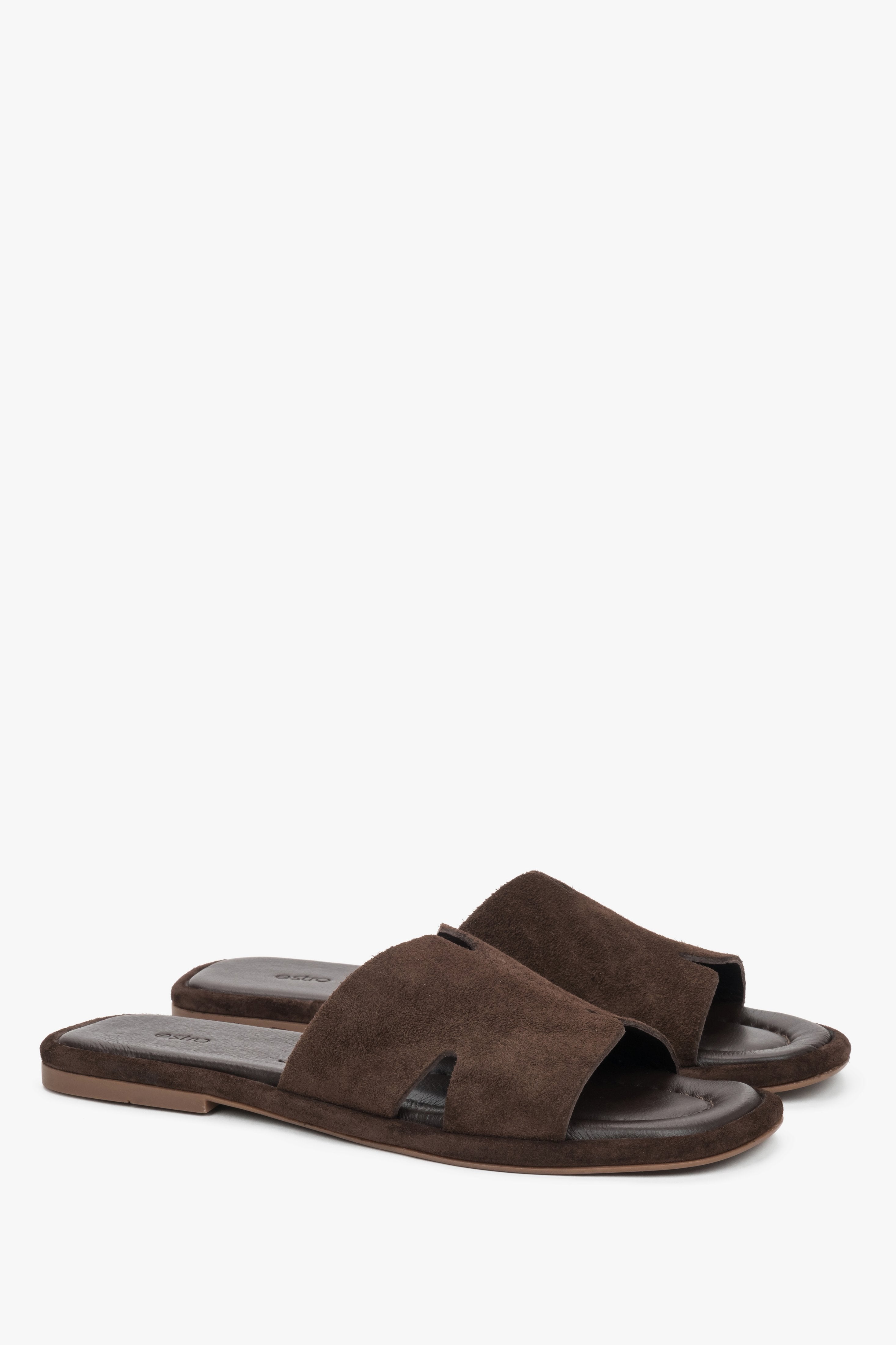 Dark brown velour Estro mules, showcasing distinctive geometric cut-outs and the velvety texture of genuine velour.