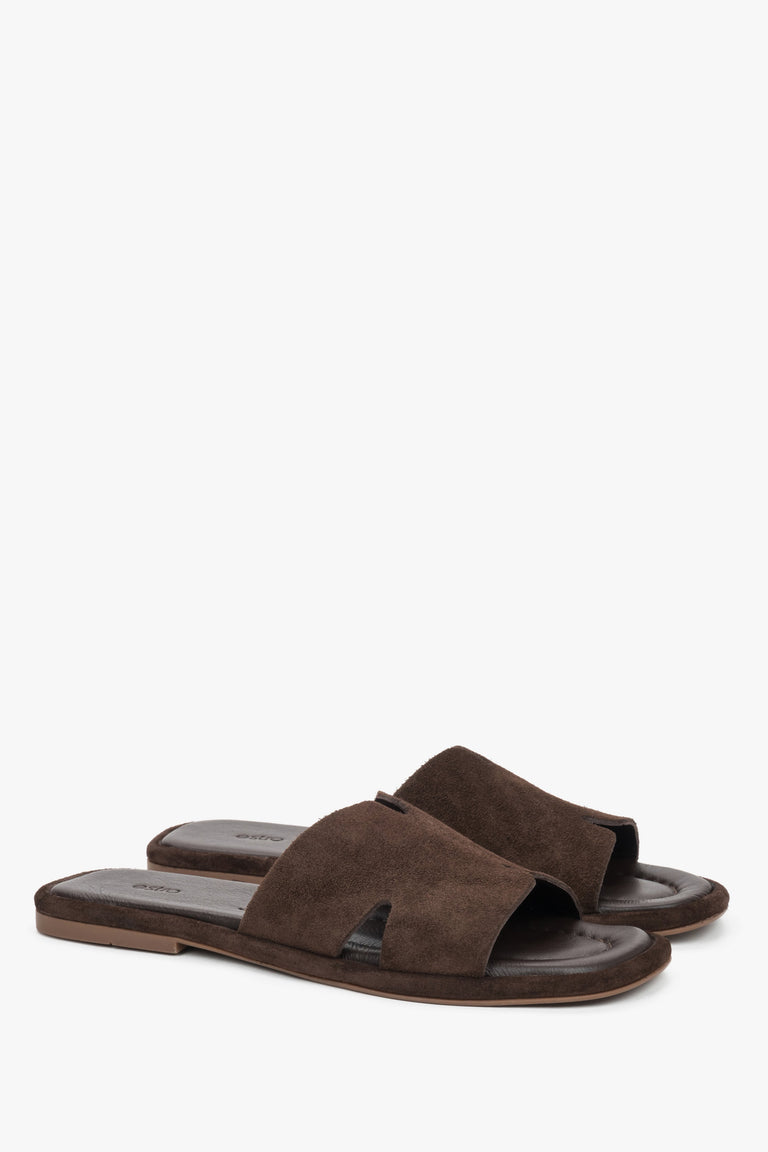 Dark brown velour Estro mules, showcasing distinctive geometric cut-outs and the velvety texture of genuine velour.