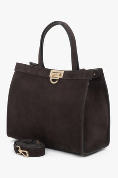 Refined women’s velour bag featuring a structured silhouette and logo-accented buckle closure.