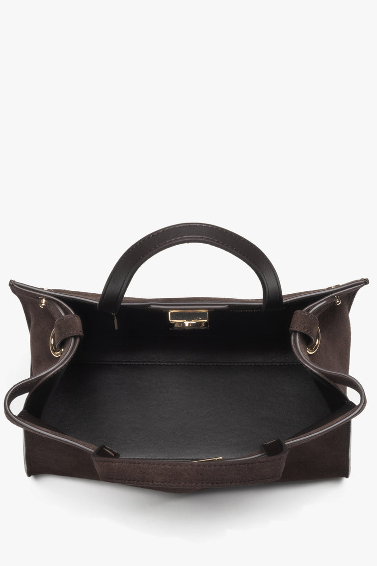 Compact and stylish shoulder bag in a deep brown shade, perfect for everyday essentials.