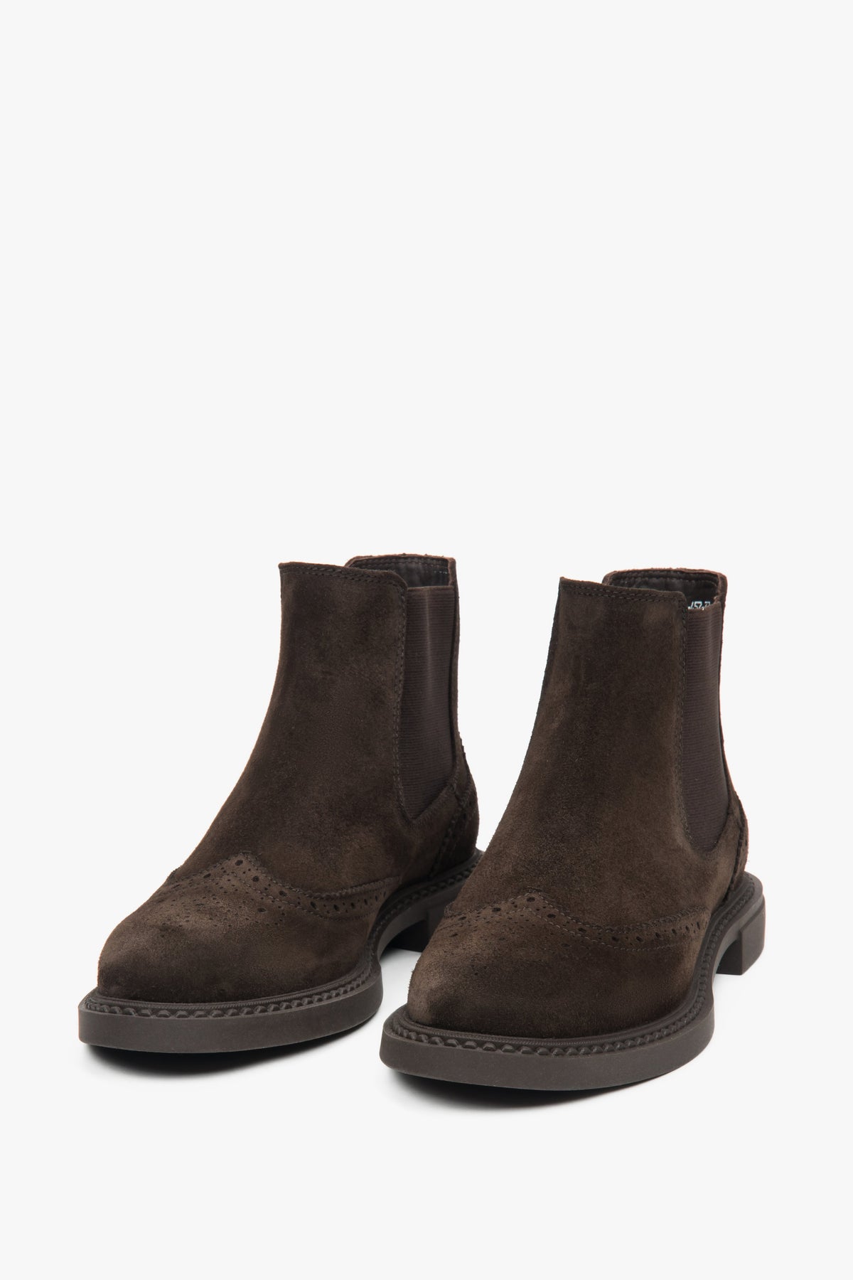 Velour Chelsea boots in dark brown with decorative perforation on the toe and shaft, and elastic side panels.