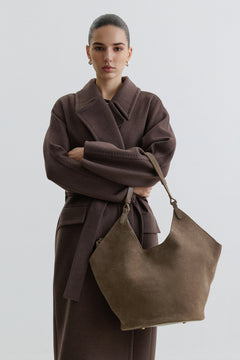Dark grey hobo bag made from soft, premium Italian velour, featuring a relaxed silhouette and elegant magnetic closure for everyday style.