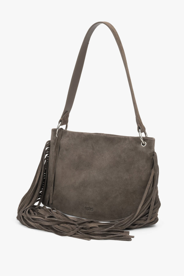 A profile shot of the bag highlighting its optimal depth of 13 cm, a comfortable shoulder strap, and silver metal hardware.