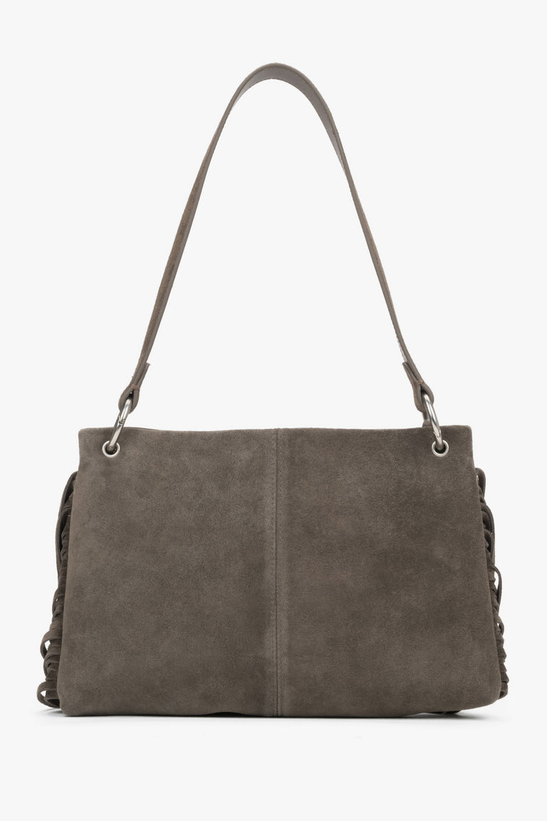 The back of the bag displaying precise, vertical stitching down the center and the matte, luxurious texture of the dark grey suede material.