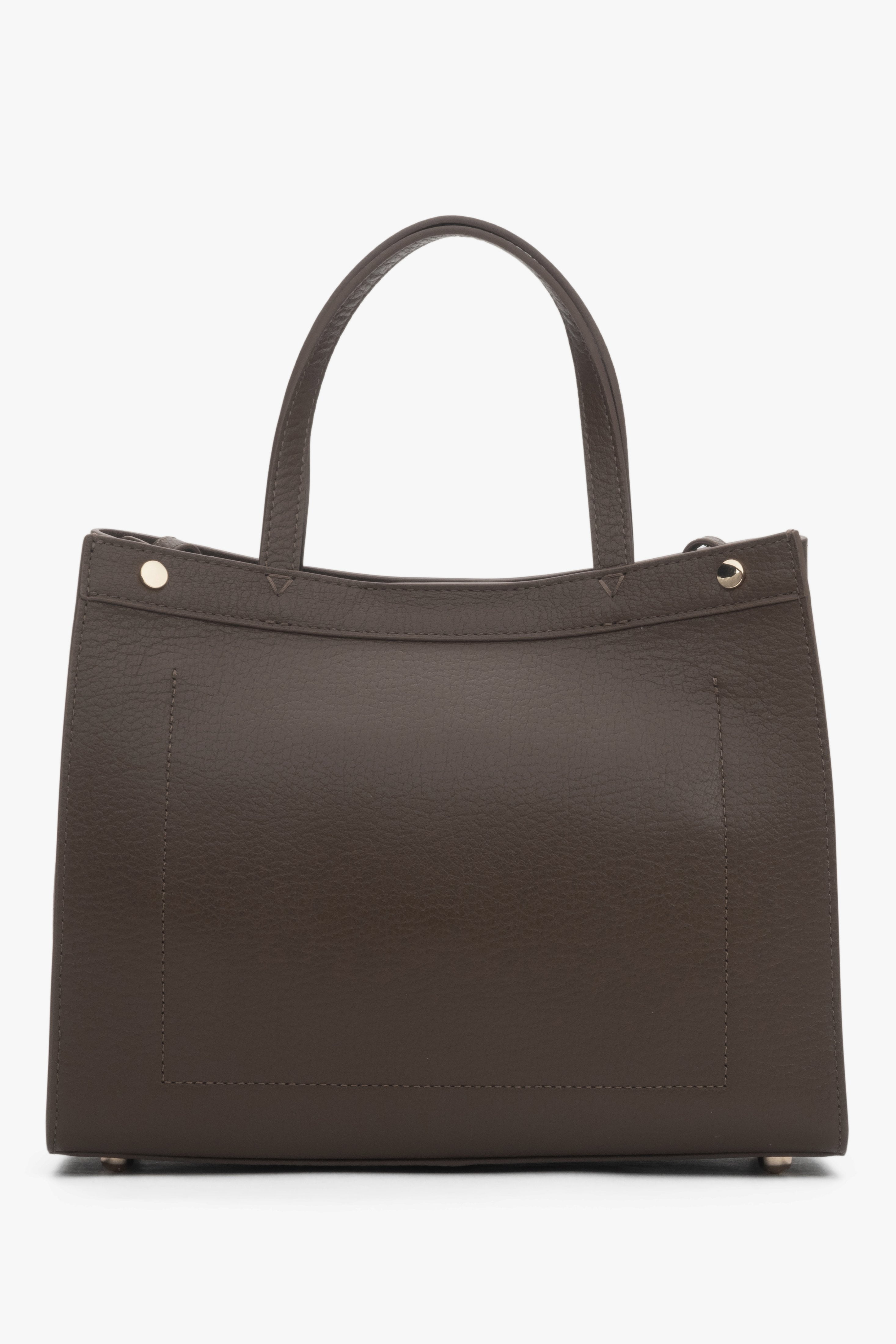Elegant dark mocha tote bag made of genuine leather with refined gold hardware and a structured silhouette.