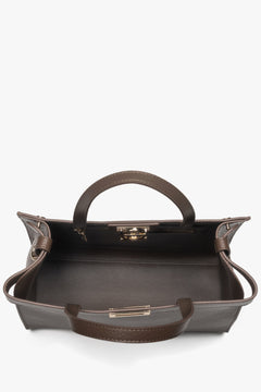 Sophisticated leather tote bag with a compact shape, perfect for everyday essentials and polished daily looks.