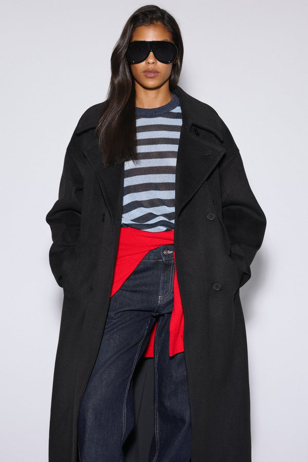 Long women's black natural wool coat, double-breasted design with a belt by Estro.