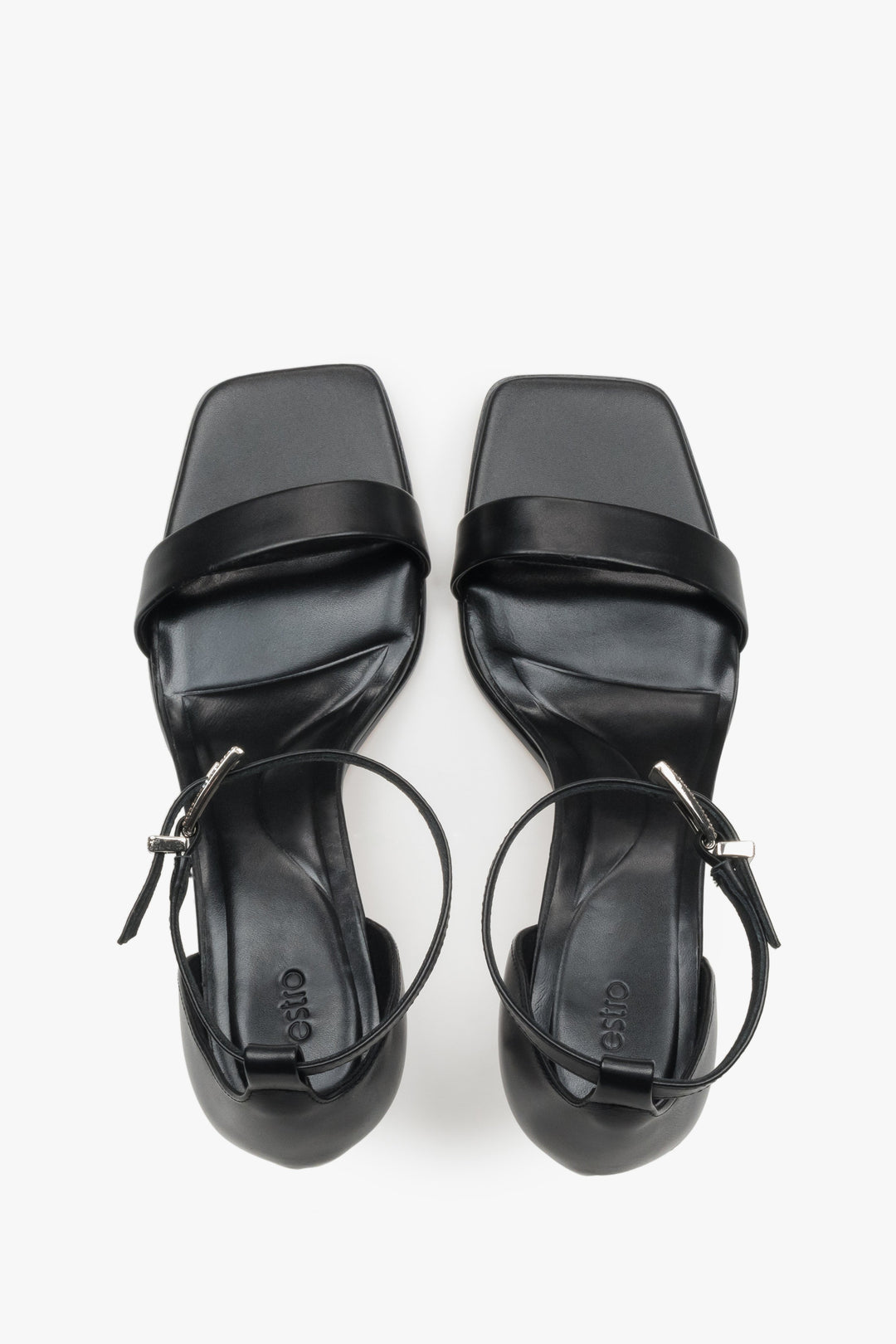 Elegant black leather evening sandals featuring a premium leather interior.